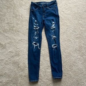 American Eagle Next Level Stretch medium rise patched skinny jeans, Size 4